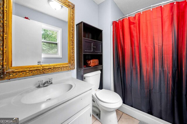 115 S Meadowcliff Cir, Carrollton, GA 30116 - full bathroom featuring vanity, tile patterned flooring, toilet, and curtained shower