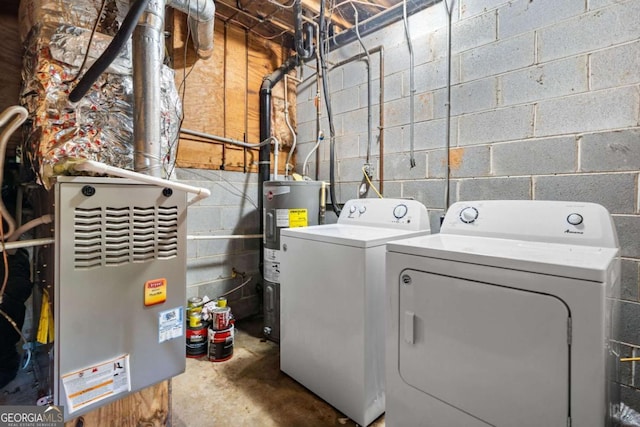115 S Meadowcliff Cir, Carrollton, GA 30116 - washroom featuring water heater, washing machine and dryer, and heating unit