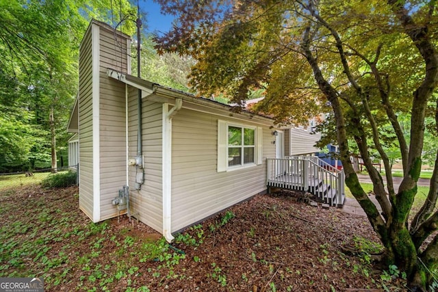 115 S Meadowcliff Cir, Carrollton, GA 30116 - view of side of property featuring a chimney