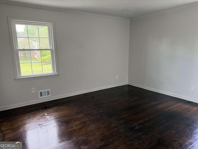 5460 Huron Dr, Morrow, GA 30260 - unfurnished room with dark wood finished floors, baseboards, and ornamental molding