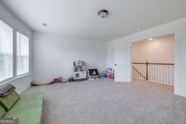 game room with carpet floors