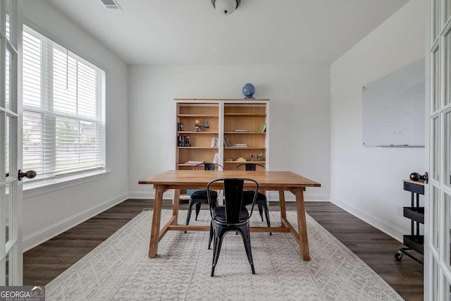 office featuring wood finished floors and baseboards