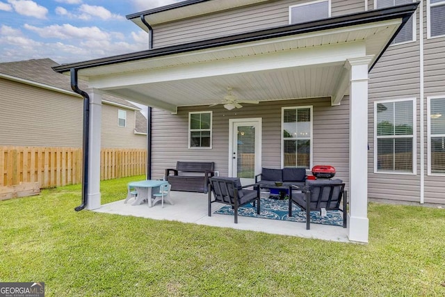 rear view of house with an outdoor hangout area, a patio area, and a ceiling fan