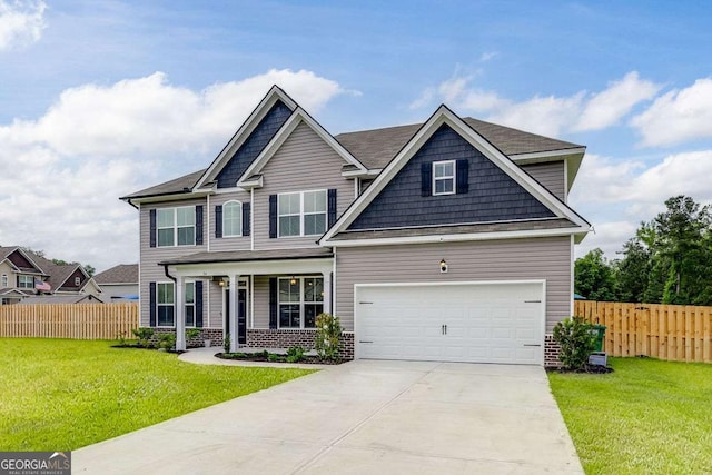 craftsman-style house with covered porch and concrete driveway