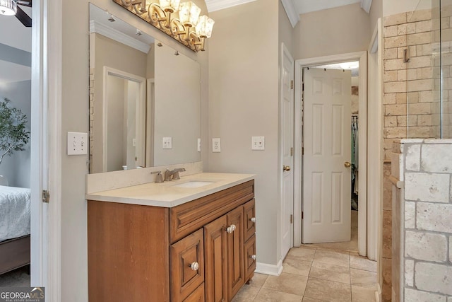 full bath with ornamental molding, tile patterned floors, a chandelier, vanity, and ensuite bathroom