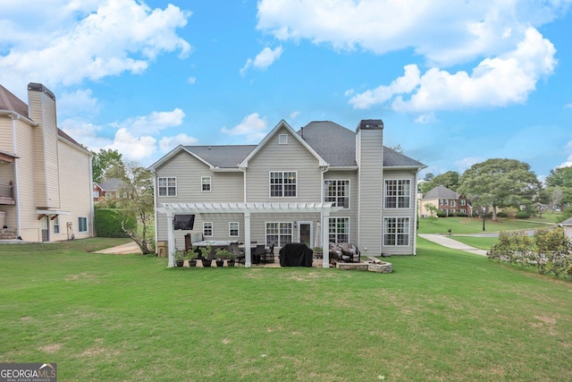 rear view of property featuring a pergola, a patio area, a yard, and a chimney