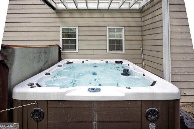 deck with a hot tub