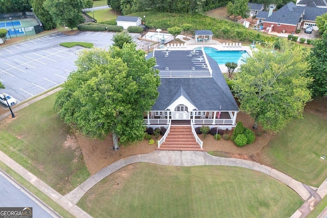 drone / aerial view of a pool