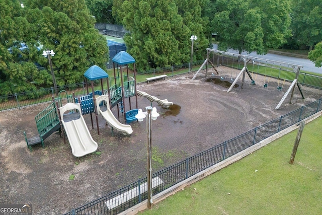 community jungle gym with fence