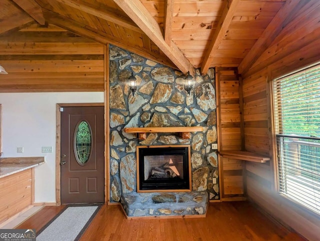 350 Left Turn Unit 15, Blue Ridge, GA 30513 - foyer with wood ceiling, a stone fireplace, wood finished floors, and wooden walls