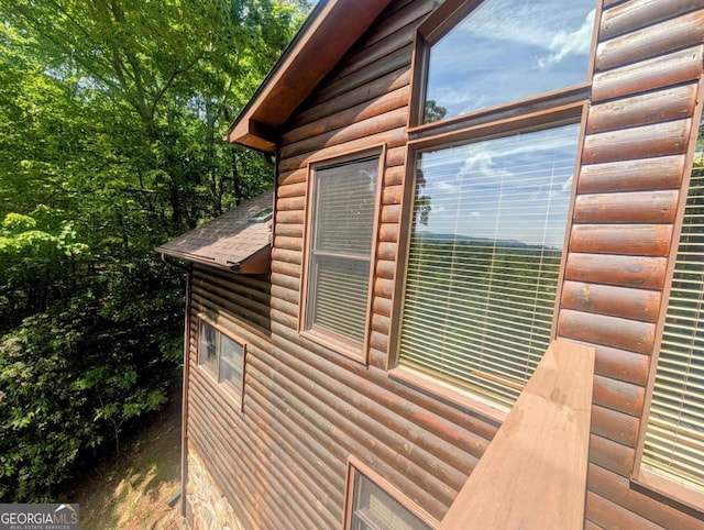 350 Left Turn Unit 15, Blue Ridge, GA 30513 - view of property exterior with faux log siding and roof with shingles