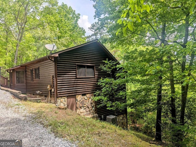350 Left Turn Unit 15, Blue Ridge, GA 30513 - view of side of property featuring central AC unit and log veneer siding