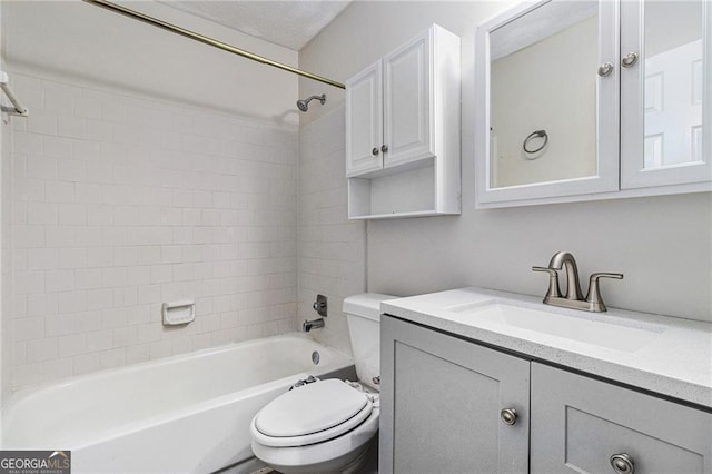full bathroom featuring toilet,  shower combination, and vanity