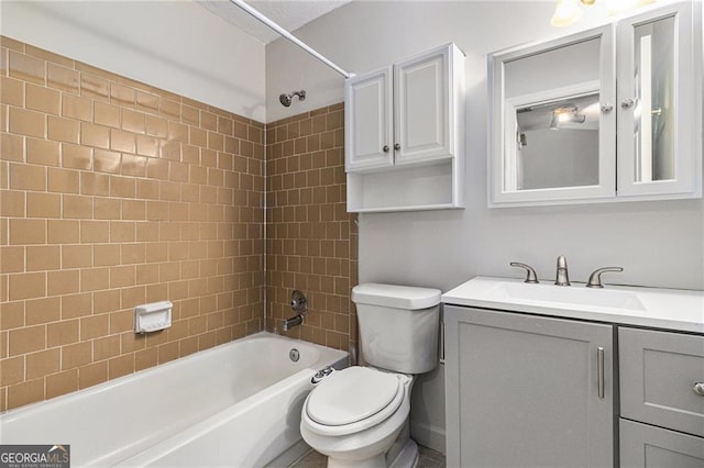 full bath featuring toilet, vanity, and shower / tub combination