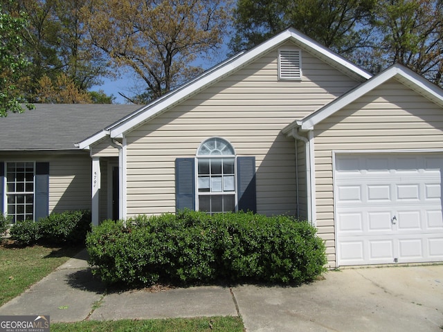 5799 Eagles Feather Ln, Riverdale, GA 30274 - view of property exterior with a garage