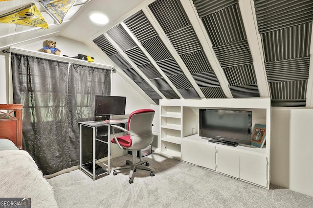 carpeted office space with lofted ceiling