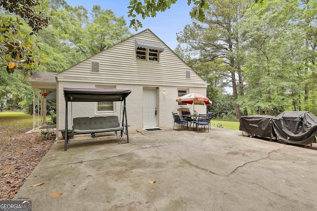 view of patio / terrace featuring a grill and outdoor dining space