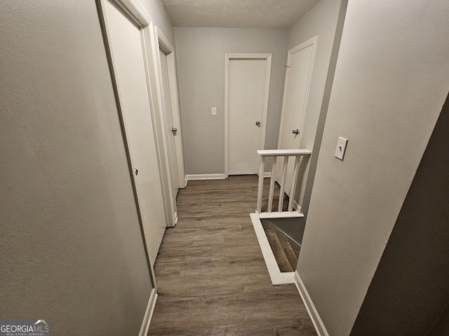 2860 Cocklebur Cove Ct, Decatur, GA 30034 - corridor featuring wood finished floors and baseboards