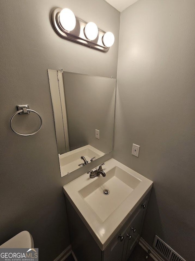 2860 Cocklebur Cove Ct, Decatur, GA 30034 - half bathroom with vanity and toilet
