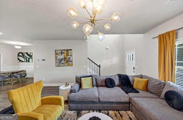 139 Coldwater Ln, Griffin, GA 30224 - living area featuring wood finished floors and a chandelier