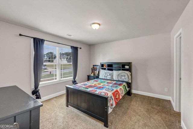 139 Coldwater Ln, Griffin, GA 30224 - carpeted bedroom featuring baseboards