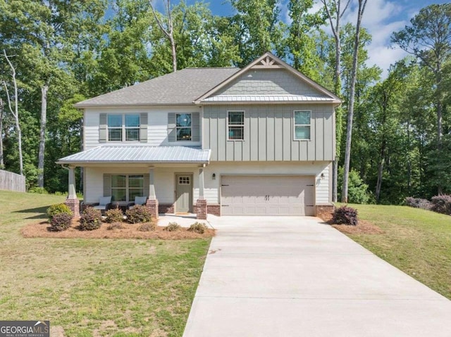 139 Coldwater Ln, Griffin, GA 30224 - view of front of house featuring covered porch, board and batten siding, a garage, driveway, and a front lawn