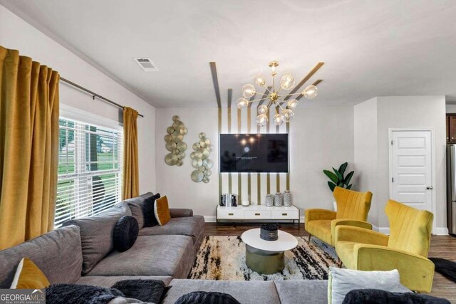 139 Coldwater Ln, Griffin, GA 30224 - living area featuring wood finished floors and a chandelier
