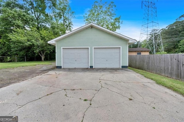detached garage with fence