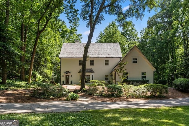 1260 Heards Ferry Rd, Sandy Springs, GA 30328 - view of front facade with a chimney and stucco siding
