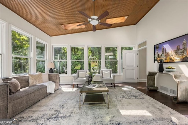 1260 Heards Ferry Rd, Sandy Springs, GA 30328 - sunroom featuring wood ceiling, a skylight, lofted ceiling, and wood finished floors