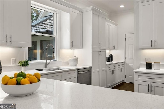 1260 Heards Ferry Rd, Sandy Springs, GA 30328 - kitchen with stainless steel dishwasher, light countertops, white cabinets, recessed lighting, and dark wood-type flooring
