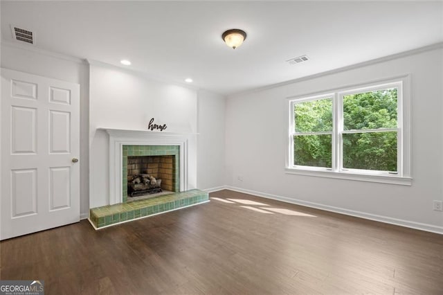 1260 Heards Ferry Rd, Sandy Springs, GA 30328 - unfurnished living room with ornamental molding, dark wood-style floors, a tile fireplace, and recessed lighting