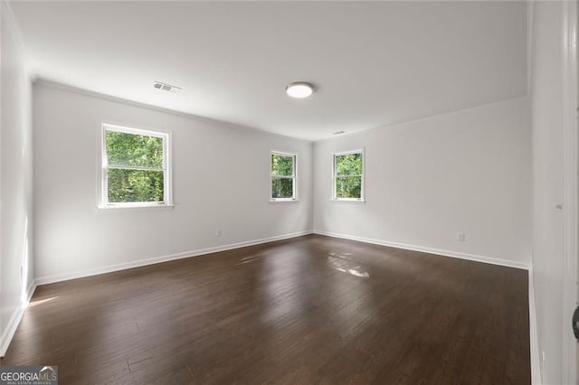 1260 Heards Ferry Rd, Sandy Springs, GA 30328 - unfurnished room with healthy amount of natural light, baseboards, and dark wood-style flooring