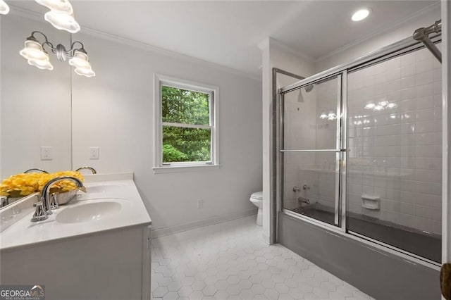 1260 Heards Ferry Rd, Sandy Springs, GA 30328 - full bath with crown molding, toilet, enclosed tub / shower combo, double vanity, and tile patterned flooring