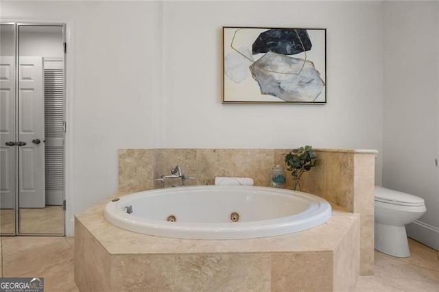 1260 Heards Ferry Rd, Sandy Springs, GA 30328 - full bath featuring a tub with jets, toilet, and tile patterned floors