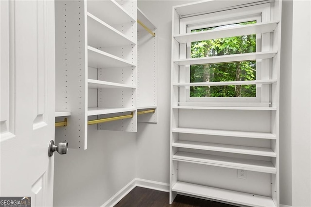 1260 Heards Ferry Rd, Sandy Springs, GA 30328 - spacious closet featuring dark wood finished floors