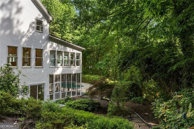 1260 Heards Ferry Rd, Sandy Springs, GA 30328 - view of property exterior with stucco siding