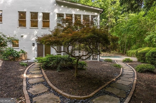 1260 Heards Ferry Rd, Sandy Springs, GA 30328 - back of house with stucco siding