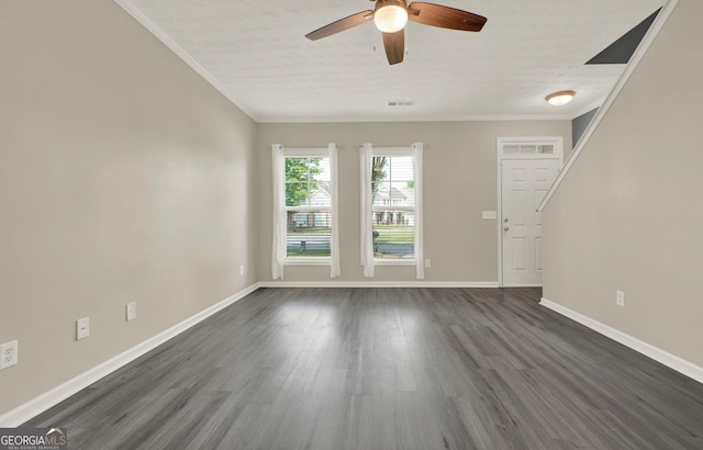 556 Poplar Bnd, Canton, GA 30114 - unfurnished living room with a ceiling fan, dark wood-style floors, baseboards, and ornamental molding
