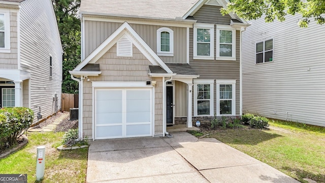 556 Poplar Bnd, Canton, GA 30114 - traditional-style house featuring board and batten siding, cooling unit, stone siding, concrete driveway, and a shingled roof