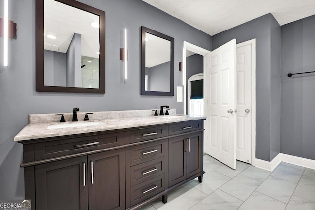 556 Poplar Bnd, Canton, GA 30114 - full bath with marble look tiles, double vanity, and baseboards