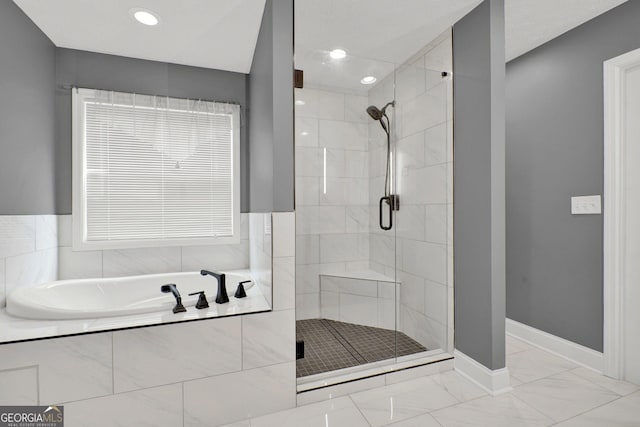 556 Poplar Bnd, Canton, GA 30114 - bathroom featuring a stall shower, a garden tub, marble finish flooring, recessed lighting, and baseboards