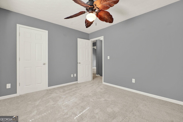 556 Poplar Bnd, Canton, GA 30114 - unfurnished bedroom with carpet, baseboards, and ceiling fan