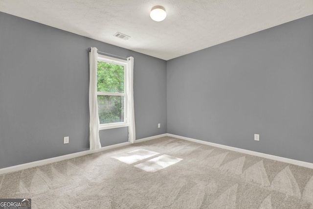 556 Poplar Bnd, Canton, GA 30114 - unfurnished room featuring carpet flooring, baseboards, and a textured ceiling