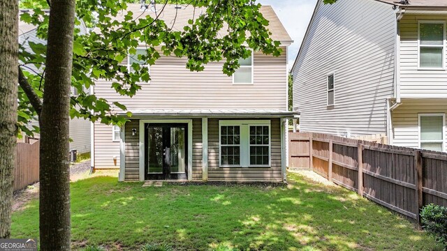 556 Poplar Bnd, Canton, GA 30114 - rear view of house with french doors