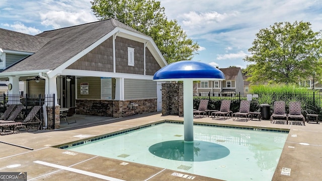 556 Poplar Bnd, Canton, GA 30114 - community pool featuring fence, a patio area, and a ceiling fan