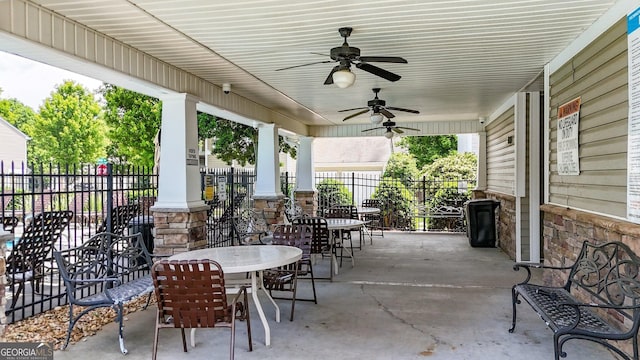556 Poplar Bnd, Canton, GA 30114 - view of patio / terrace featuring fence, outdoor dining area, and ceiling fan