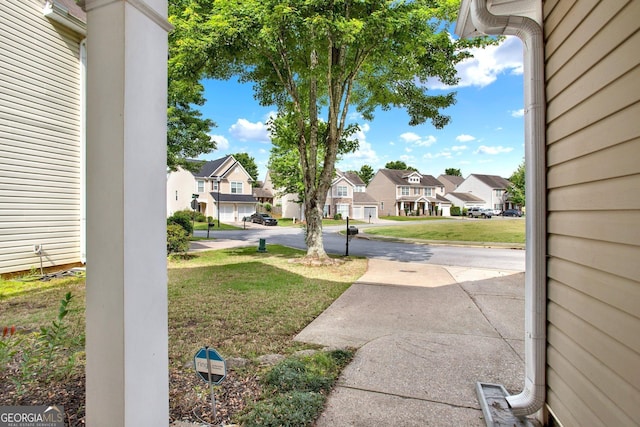 556 Poplar Bnd, Canton, GA 30114 - view of green lawn featuring a residential view