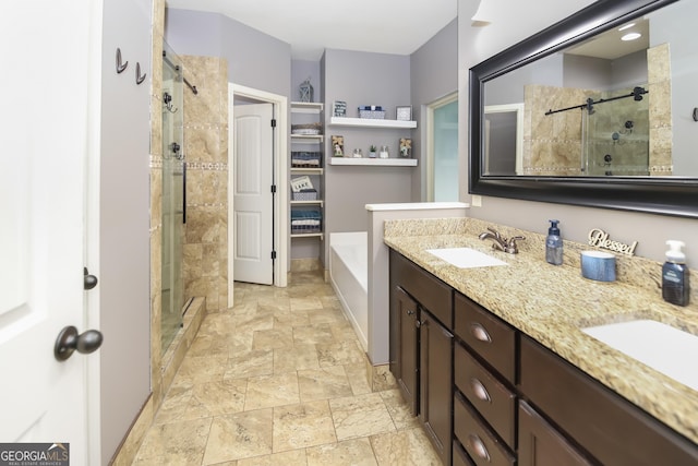 121 Hidden Springs Dr, Lagrange, GA 30240 - full bath featuring stone tile flooring, a shower stall, double vanity, and a bath