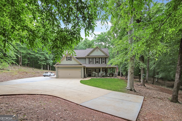 121 Hidden Springs Dr, Lagrange, GA 30240 - craftsman-style home with covered porch, concrete driveway, board and batten siding, roof with shingles, and a front lawn